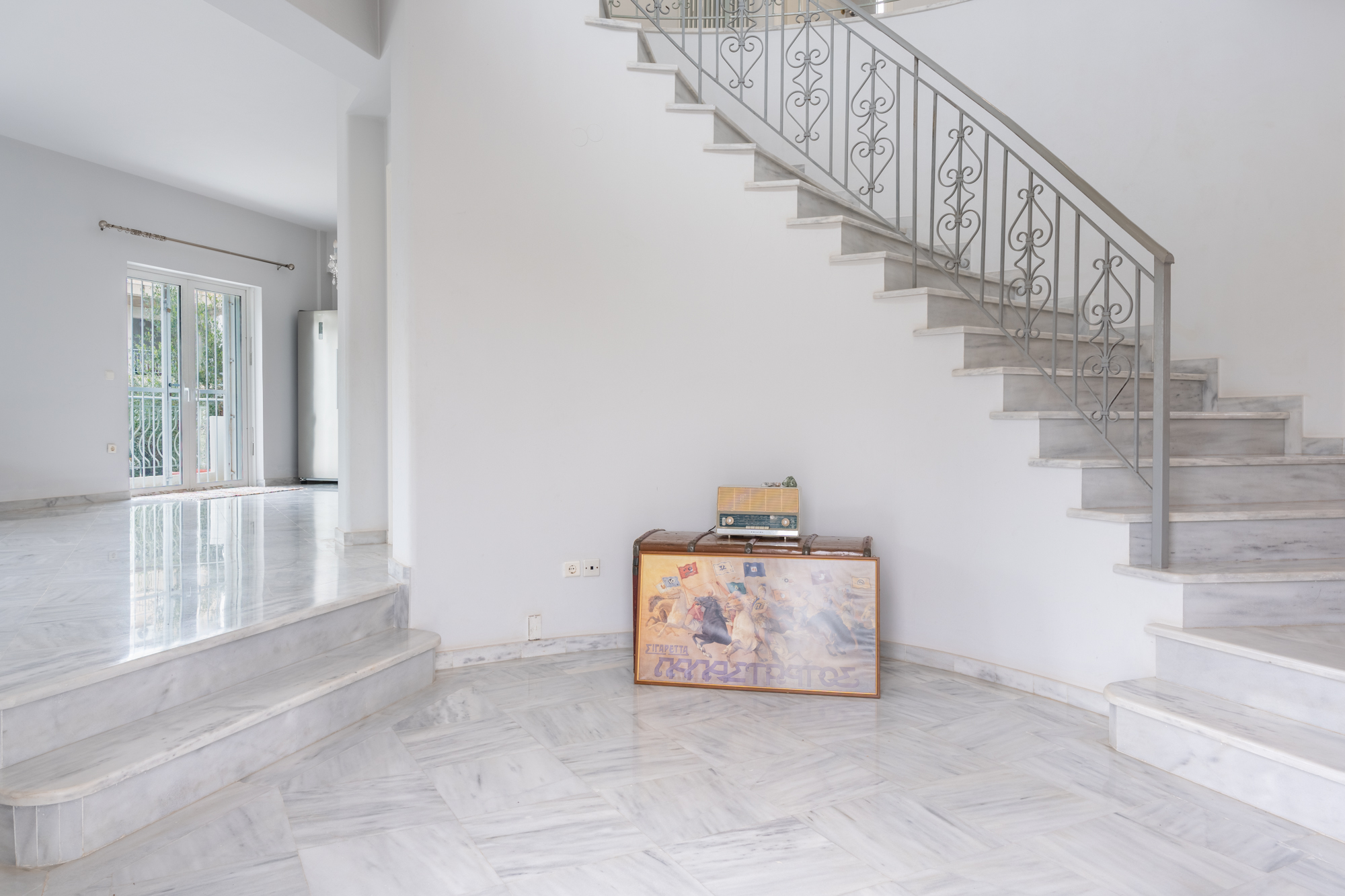 Foyer with marble staircase
